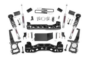 Rough Country Suspension Lift Kit 4 in. Lifted Knuckles Drop Brackets Sway-Bar Brake Line Drive Shaft Spacer 1/4 in. Thick Plate Steel Fabricated Blocks Includes N3 Shocks - 59931