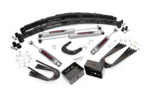 Rough Country Suspension Lift Kit w/Shocks 4 in. Lift Incl. Leaf Springs Steering Arm Brake Line Reloc. Brkt. Blocks U-Bolts Hardware Front and Rear Premium N3 Shocks - 11530