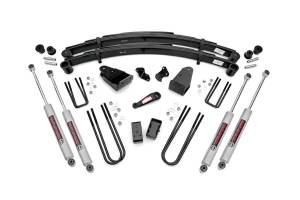 Rough Country Suspension Lift Kit w/Shocks 4 in. Lift Incl. Leaf Springs Trackbar/I-Beam Drop Brkt Pitman Arm Blocks U-Bolts Hardware Front and Rear Premium N3 Shocks - 490-87UP30