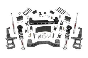 Rough Country Suspension Lift Kit 4 in. Lifted Knuckles Drop Brackets Sway-Bar Brake Line Drive Shaft Spacer 1/4 in. Thick Plate Steel Fabricated Blocks Includes N3 Shocks - 55531